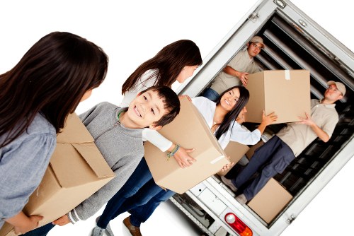 Office removal van and movers preparing a business relocation in Yeading