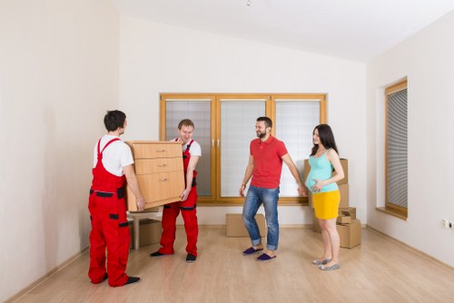 Organised unpacking in a Yeading flat after moving day