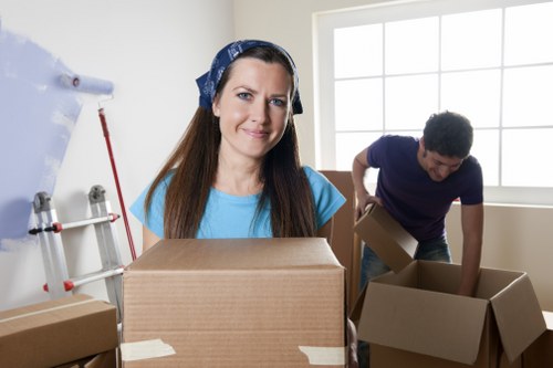 Furniture and boxes being loaded into a moving van in Yeading