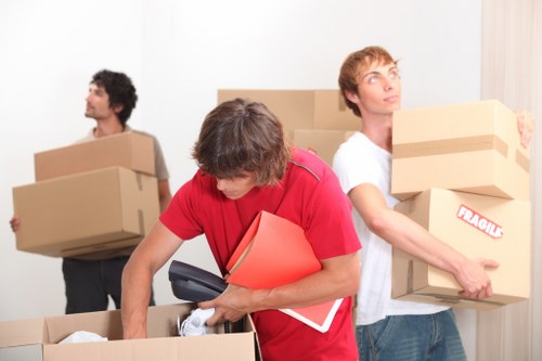 Prepared moving day checklist and packed boxes for a Yeading house move