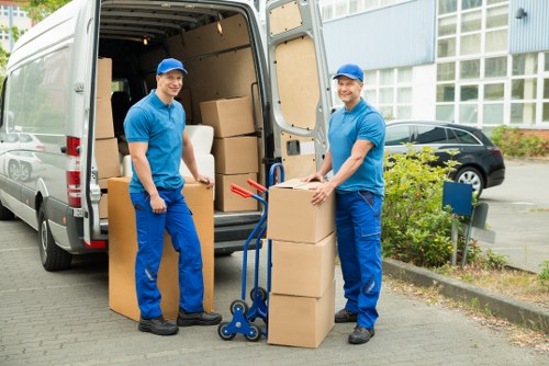Local removals team handling boxes and household items in Yeading