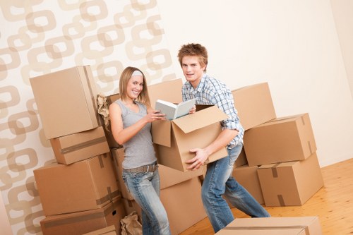 Professional movers loading furniture for a home removal